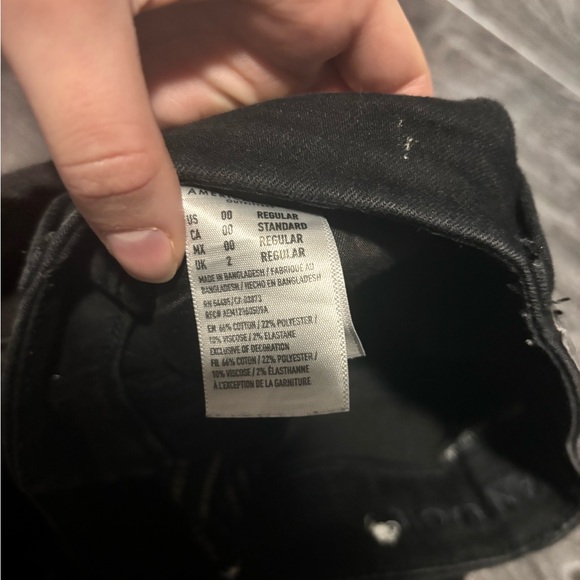 American Eagle black ripped “next level stretch” skinny jeans. Size 00 - Picture 5 of 7